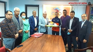 Nepal NOC presents equipment to Tokyo-bound marathon runner Parki