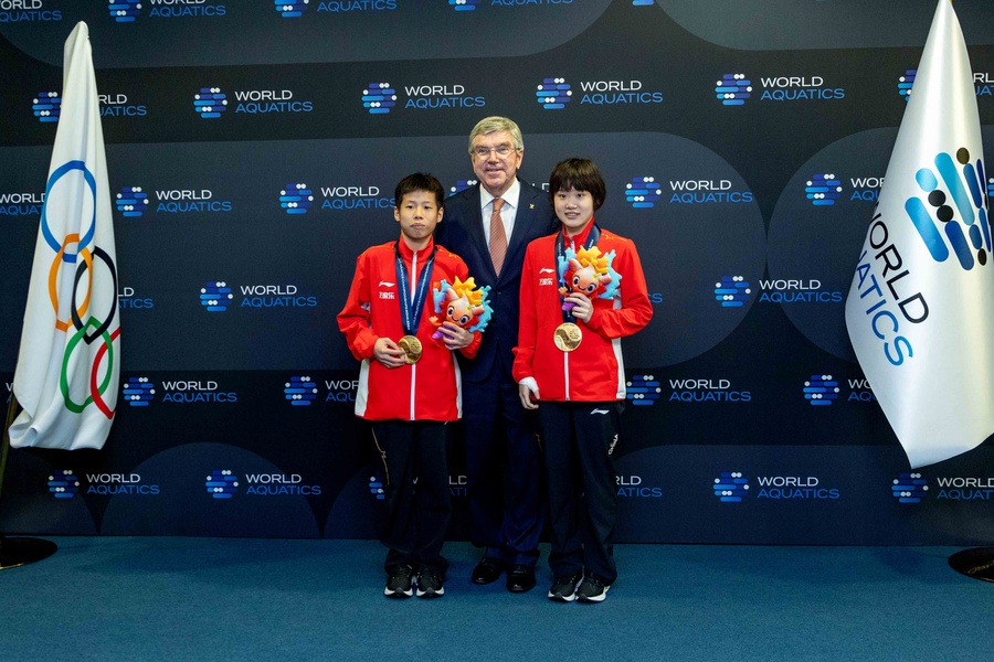 China’s new world champions meet the media after the medal presentation ceremony on Saturday. (Photo: OCA)