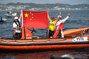 China’s Lu sails to windsurfing gold