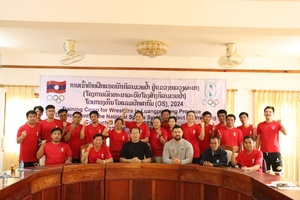 Olympic champion guides wrestlers in Laos training camp