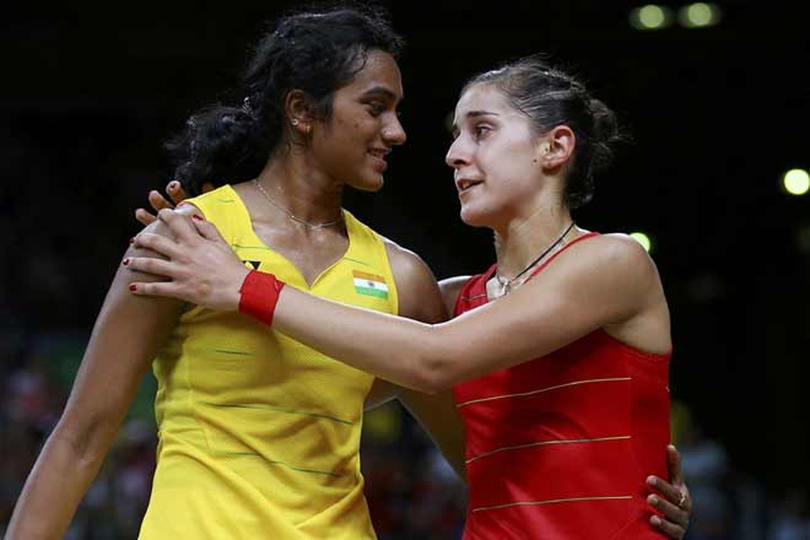 Carolina Marin and PV Sindhu embrace after the Rio 2016 final. © Reuters