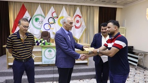 Iraq NOC President honours young taekwondo players