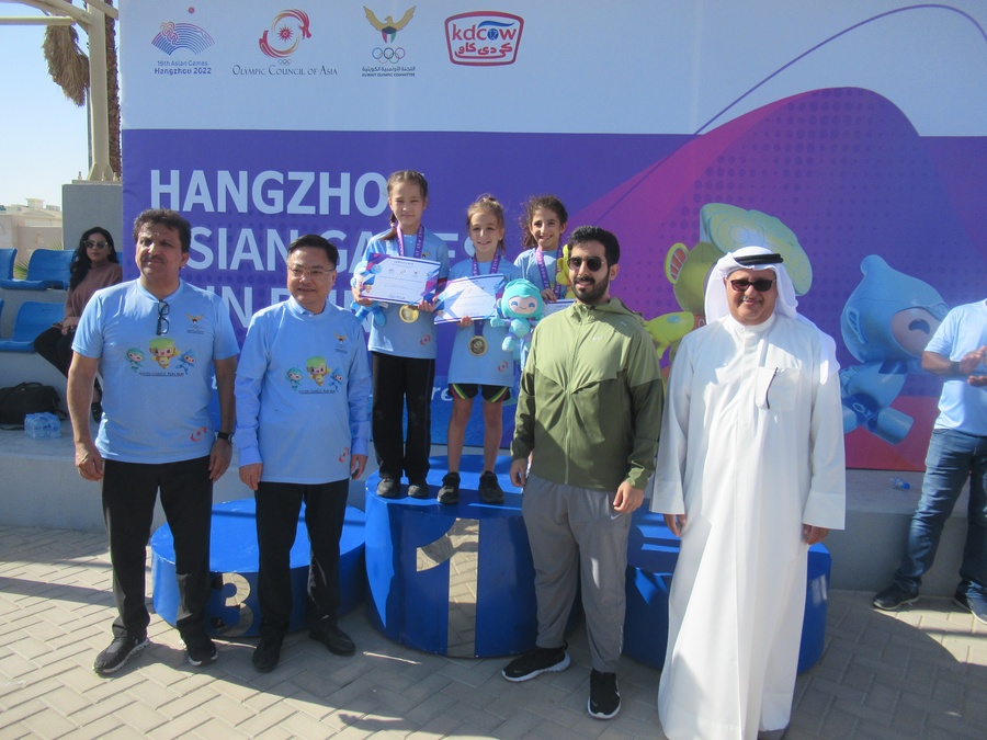 China’s Ambassador to Kuwait, HE Zhang Jianwei, is pictured (second from left) at the prize presentation. © OCA