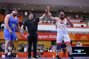 Mirzazadeh continues domination of Greco heavyweights with gold on opening day of wrestling