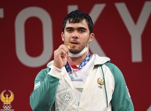 Uzbek weightlifter Akbar Djuraev sets two Olympic records on his way to gold