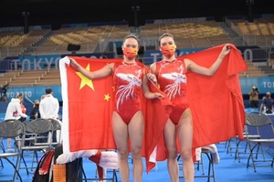 Zhu leads Chinese 1-2 in women’s trampoline gymnastics