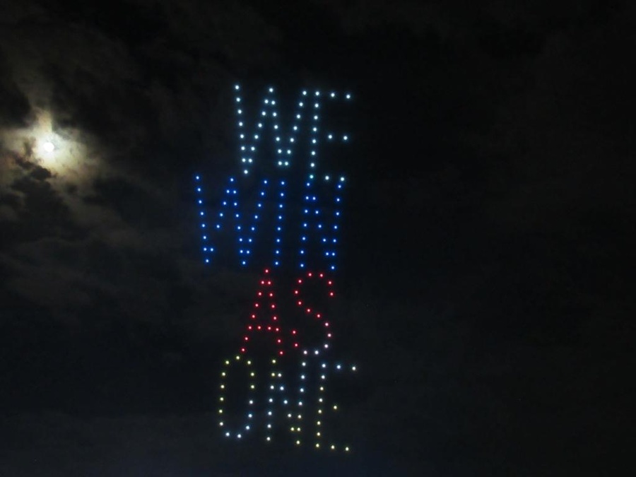 The drone show spells out the Games motto “We win as one” during the closing ceremony.