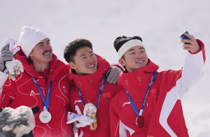 Wang follows wife Xu in winning aerials gold