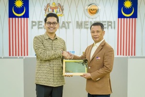 OCM President visits Malaysia's Sports Minister