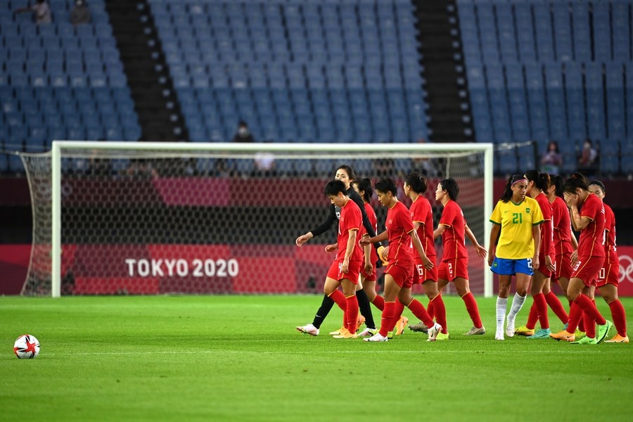 China's women's football team leave the field after the match in Miyagi, Japan, on July 21, 2021. © Xinhua/Lu Yang