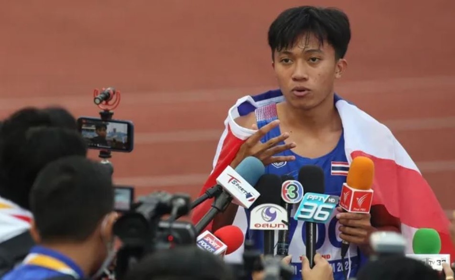 Thailand's Puripol Boonson talks to the media after completing the sprint double. © SEA Games 2021