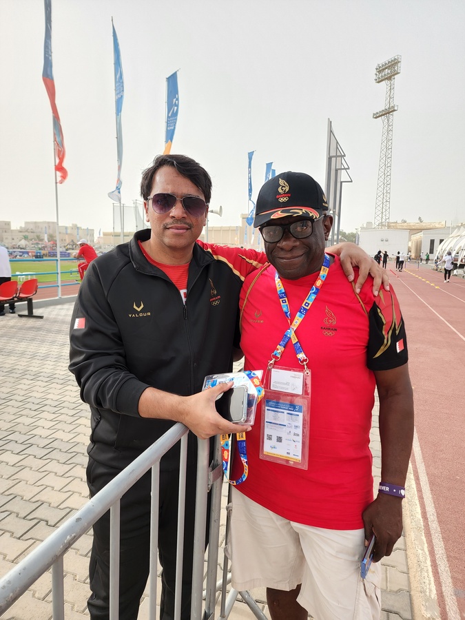 Bahrain athletics team manager Mohammed Abdulaziz Hasan with sprint coach Raymond Graham. © OCA