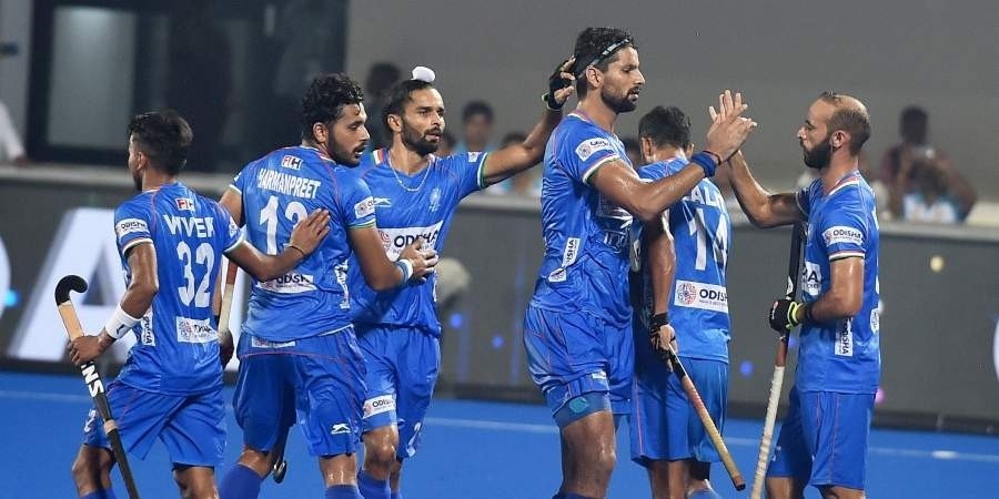 India's men's hockey team celebrate after clinching a Tokyo 2020 Olympic berth. © New Indian Express