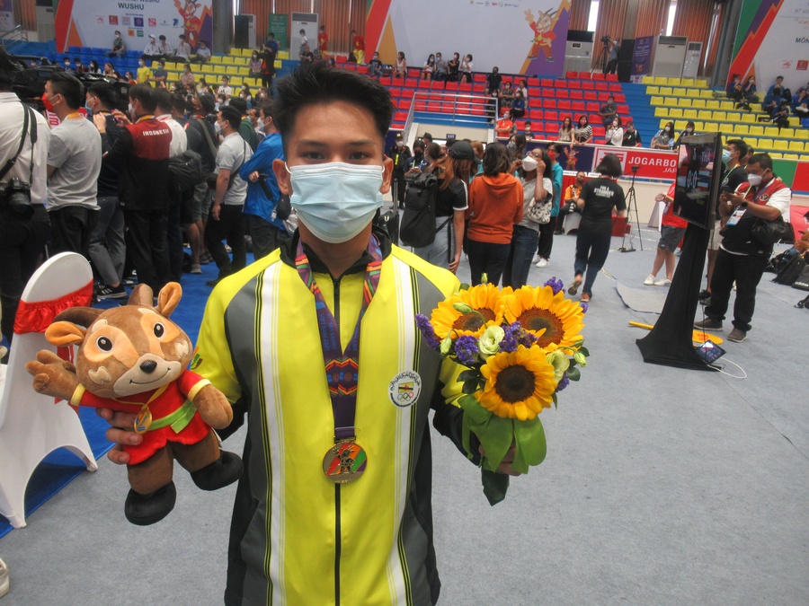Brunei wushu hero Mohammad Adi Salihin Roslan after winning the men’s nanquan event in Hanoi on Saturday. © OCA