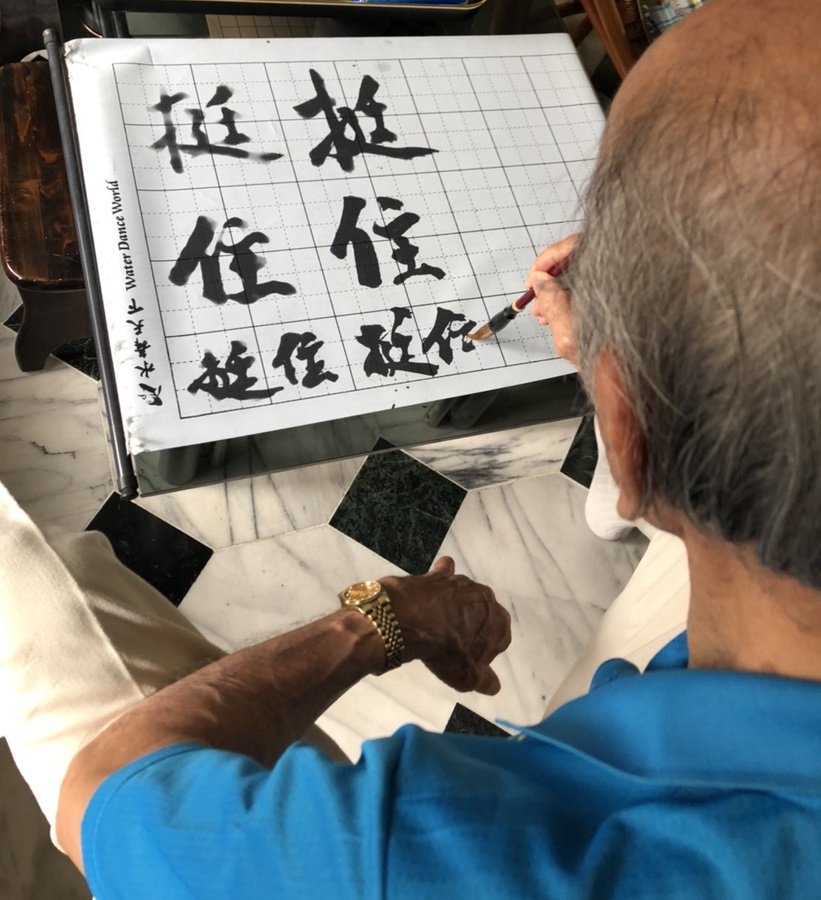 Professor WU A-Min(Middle), who won the gold in decathlon in 1966 Asian .