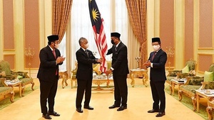 King of Malaysia hands national flag to Olympic delegation