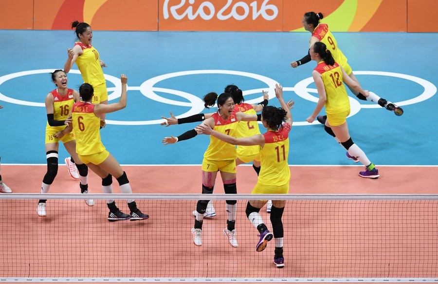 China's women's volleyball team celebrate after winning gold at the Rio Olympics on August 20, 2016. © Xinhua/Qi Heng