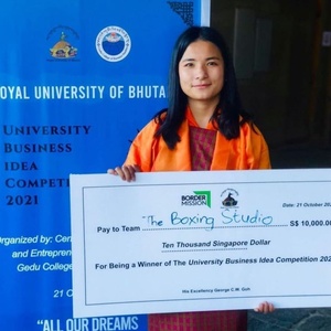 Bhutan NOC celebrates university prize for female boxer