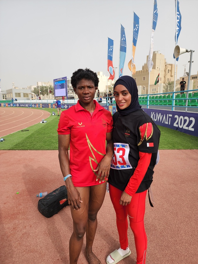 Bahrain duo Aminat Jamal (left) and Saleha Lahdan after winning gold and silver respectively in the women's 400m hurdles at the Kuwait 2022 Gulf Games. © OCA