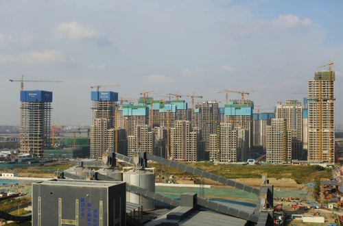 Asian Games Village reaches ‘topping off’ landmark