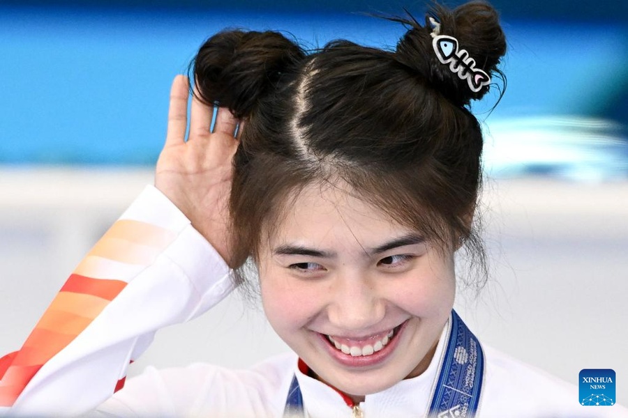 Zhang Yufei of China reacts after the women's 50m butterfly final on Saturday. ©  Xinhua/Xu Chang