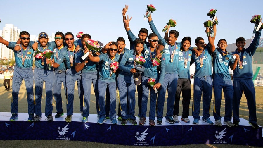 Sri Lanka men's team after winning the cricket gold medal at the 2014 Incheon Asian Games.  © cricketique.worldpress.com