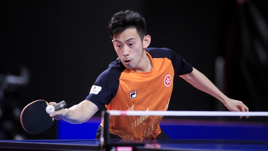 Hong Kong's Wong Chun-ting on his way to beating Czech Republic's Pavel Sirucek. © International Table Tennis Federation