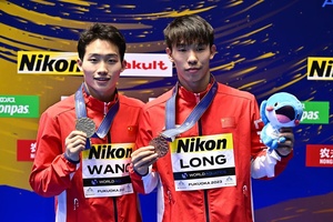 China wins gold and bronze in men’s 3m springboard