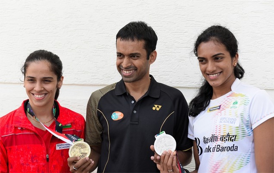 Gopichand with Saina Nehwal (left) and PV Sindhu. © Times of India