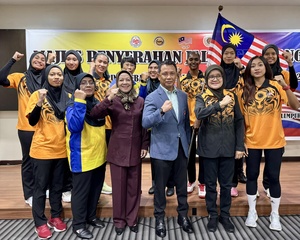 OCM President officiates at flag handover ceremony for national netball team