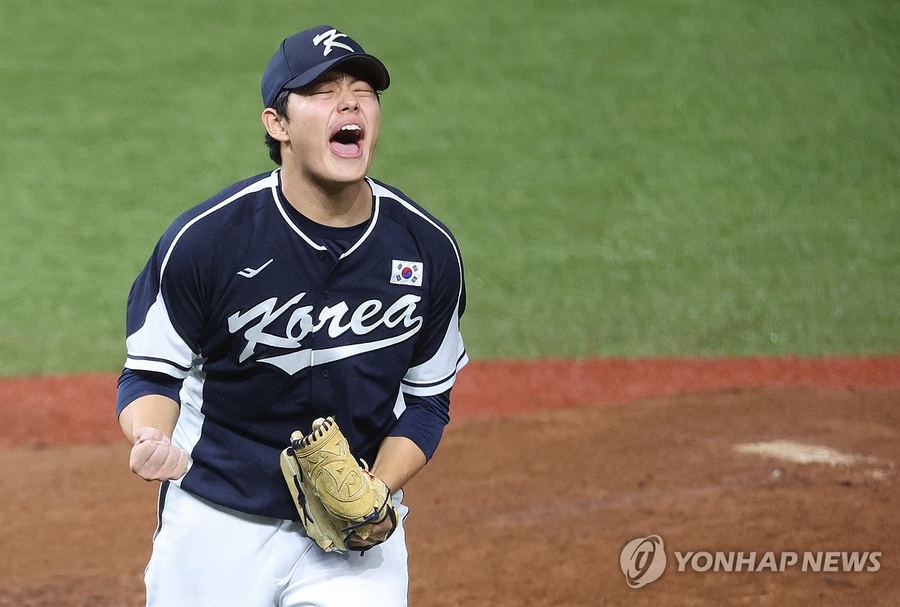 Korean starter Moon Dong-ju celebrates after retiring the side in the bottom of the sixth inning during the Asian Games baseball gold medal game against Chinese Taipei at Shaoxing Baseball and Softball Sports Centre in Shaoxing, China, on Oct. 7, 2023. (Ph