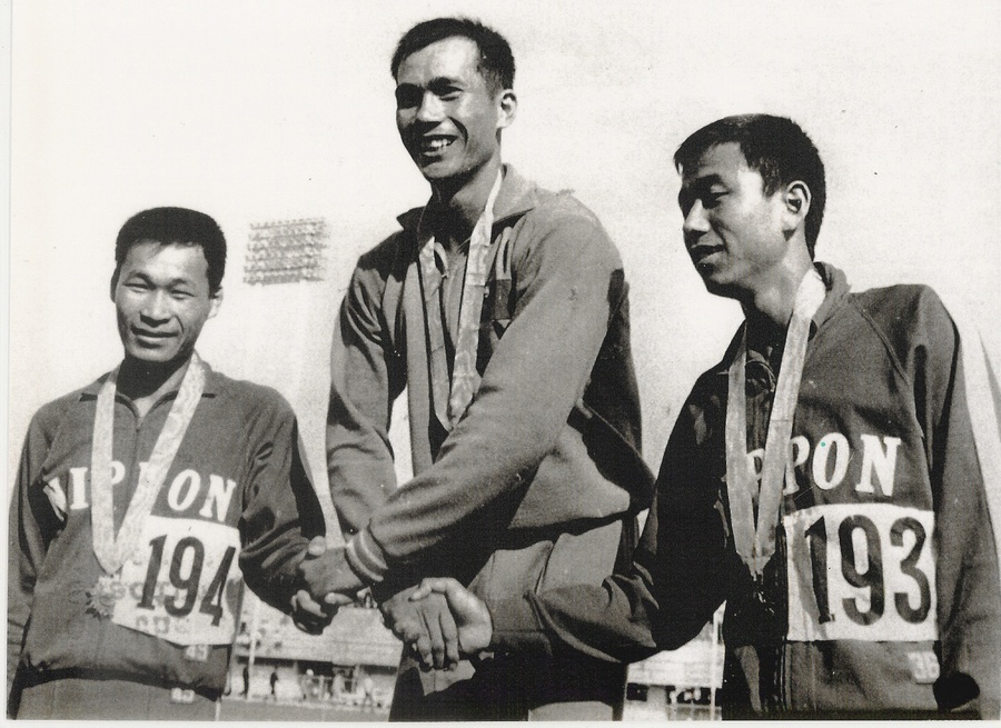 Professor WU A-Min(Middle), who won the gold in decathlon in 1966 Asian .