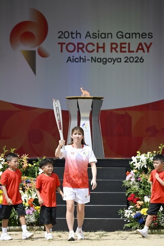 Olympic wrestling great Yoshida runs first leg of Asian Games torch relay in Nagoya