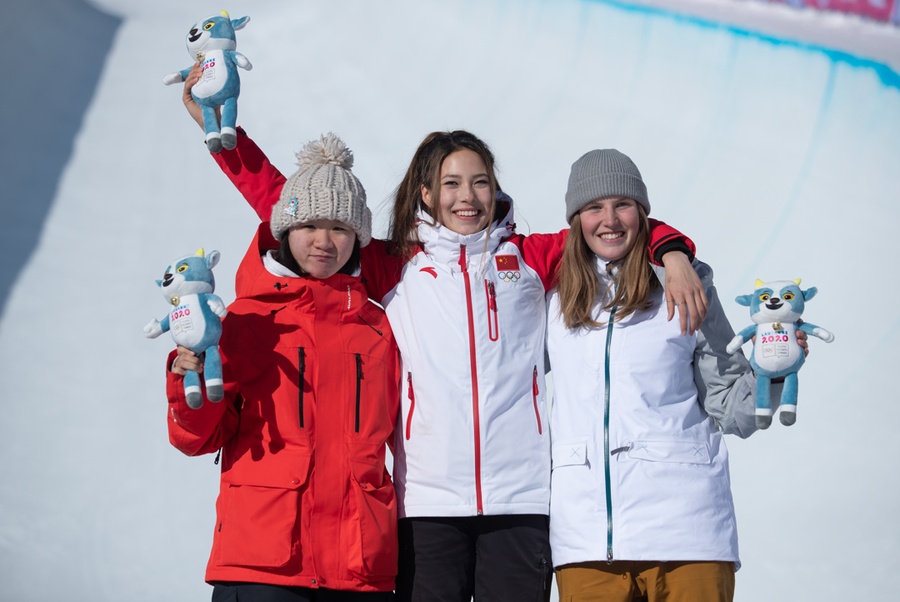 From left: Silver medallist Li Fanghui, champion Eileen Gu Ailing and bronze medal-winner Hanna Faulhaber. © Dyland Burns for OISphotos.com
