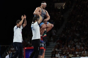 Wrestler Amin Mirzazadeh gives Iran its first medal at Paris Olympics