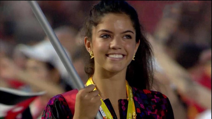 Princess Zeina Rashid carries the flag of Jordan at the Beijing 2008 opening ceremony. ©   ITTF