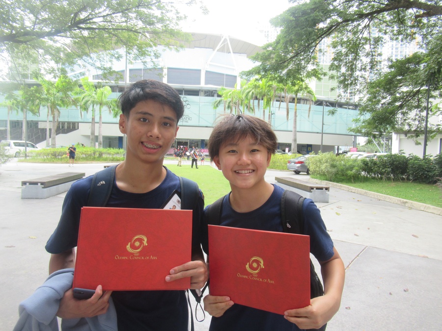 The judges receive their participation certificates. © OCA