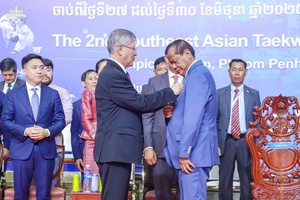 Cambodia NOC President awarded 6th Dan Black Belt