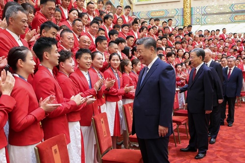 Chinese President Xi Jinping greets Olympic heroes at Great Hall of the People