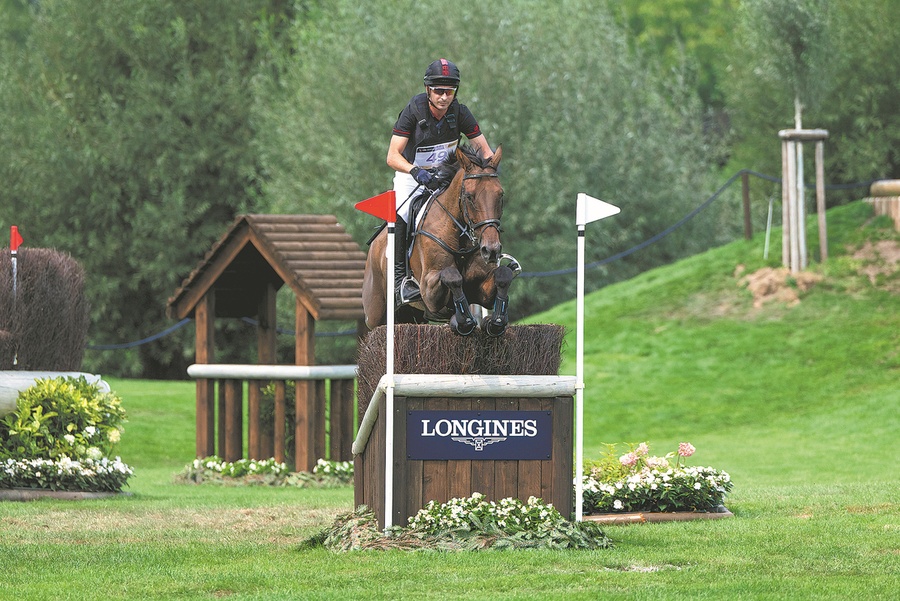 China's Alex Hua Tian, aboard Chicko, competes at the 2026 FEI World Championships in Aachen, Germany. (Photo/Agencies/China Daily)