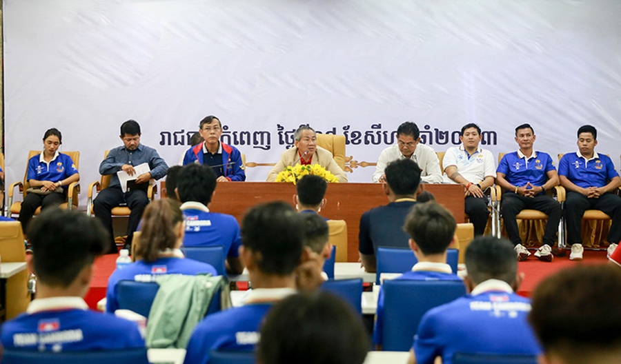 Vath Chamroeun, Secretary-General of Cambodia NOC, addresses athletes before they left for three months of training in China. © Khmer Times/Yuen Punlue