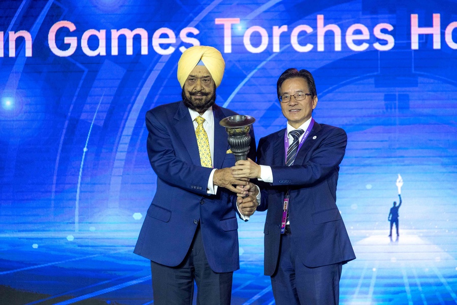 Raja Randhir Singh is pictured with Hangzhou Vice Mayor Chen Weiqiang, who is Executive Secretary General of HAGOC. The OCA presented 18 torches from previous Asian Games to the Hangzhou Asian Games Museum.