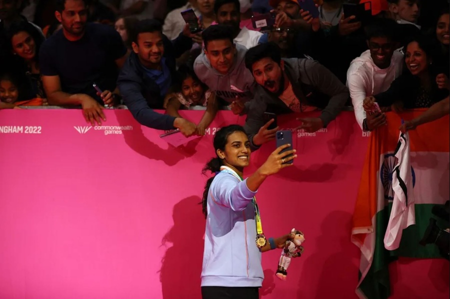 Indian superstar PV Sindhu takes a selfie with fans after beating Michelle Li of Canada in the women’s badminton final on Monday, August 8. © Robert Cianflone/Getty Images