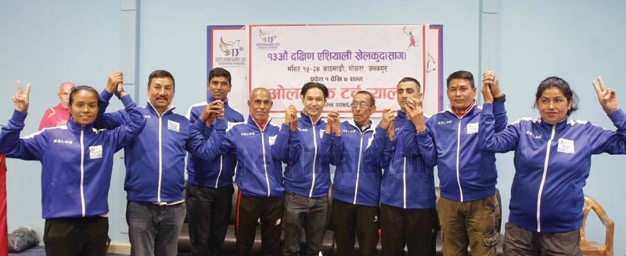 President of Nepal National and International Players Association Deepak Shrestha (centre) and Olympians pose for a group picture at a press conference to announce the Torch relay for the 13th South Asian Games. © The Himalayan Times