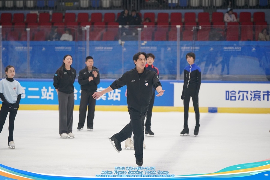 Head instructor Julian Yee applauds youth skaters for commitment and dedication