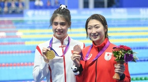 Tears flow as Zhang picks up Ikee's Asian Games mantle