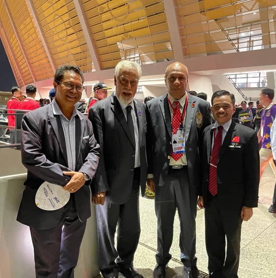Xanana Gusmao (second from left) and Laurentino Guterres (right) at the opening ceremony.