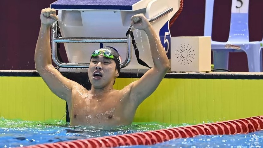 Singapore's Ong Jung Yi celebrates victory in the men’s 200m butterfly at the 2023 SEA Games on May 11 - the last day of competition. © CNA/Jeremy Long