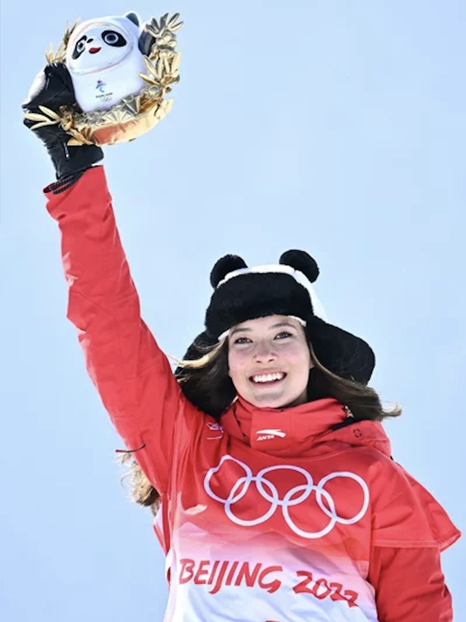 China's Eileen Gu Ailing won two gold medals and one silver at the Winter Olympics in Beijing. (Photo: Marco Bertorello/AFP via Getty Images)