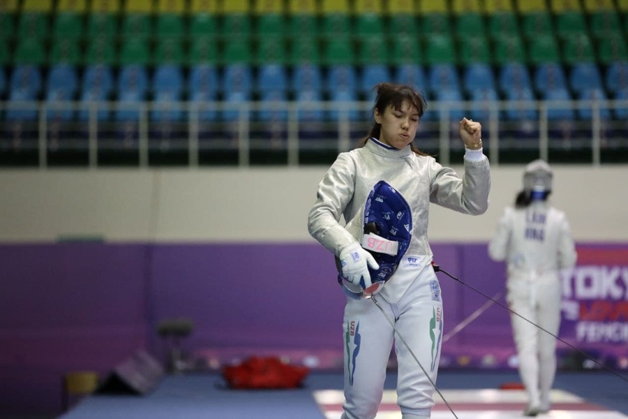 Uzbekistan's sabre fencer Zaynab Dayibekova celebrates after winning her ticket to the Tokyo Olympics. Uzbekistan National Olympic Committee